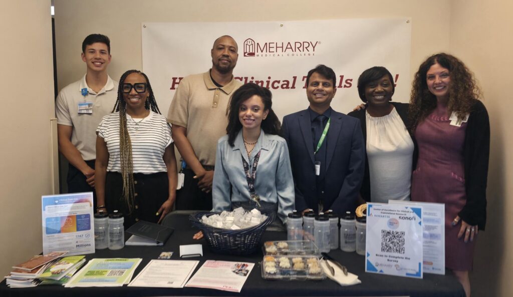 April in front of a group of Meharry Clinical Trial community engagement team members